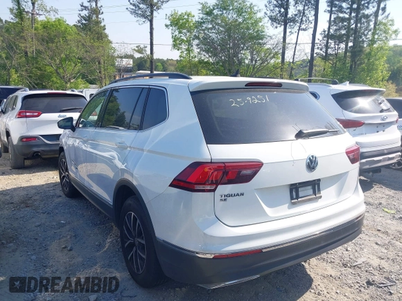 2021 Volkswagen Tiguan SE with VIN 3VV3B7AX7MM080266, listed as a IAAI auction lot 42062147 with 66,786 mi miles and . Bid and sale history available at DreamBid. Image 3.