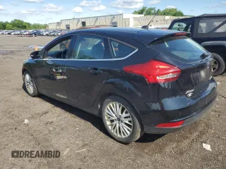 2017 Ford Focus Titanium with VIN 1FADP3N2XHL207729, listed as a Copart auction lot 59184855 with 146,768 mi miles and Salvage title. Bid and sale history available at DreamBid. Image 2.