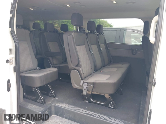 2023 Ford Transit Passenger XL with VIN 1FBAX2Y81PKA49071, listed as a IAAI auction lot 42309750 with 73,946 mi miles and . Bid and sale history available at DreamBid. Image 8.