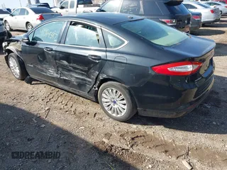 2013 Ford Fusion SE Hybrid with VIN 3FA6P0LUXDR375099, listed as a IAAI auction lot 41914387 with 133,178 mi miles. Bid and sale history available at carsss.com. Image 3.