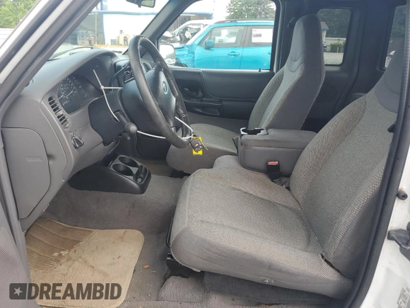 2002 Ford Ranger XL Fleet with VIN 1FTYR44U42TA55243, listed as a Copart auction lot 57310015 with 135,974 mi miles and Salvage title. Bid and sale history available at DreamBid. Image 7.