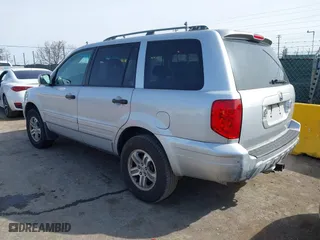 2004 Honda Pilot EX with VIN 2HKYF18514H503083, listed as a IAAI auction lot 41796369 with 172,187 mi miles. Bid and sale history available at carsss.com. Image 3.