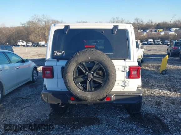 2021 Jeep Wrangler Unlimited Sahara with VIN 1C4HJXEG1MW597905, listed as a IAAI auction lot 41327138 with Not provided miles and . Bid and sale history available at DreamBid. Image 17.