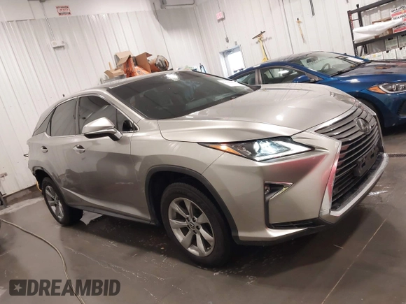 2018 Lexus RX 350 with VIN 2T2BZMCA7JC163886, listed as a IAAI auction lot 42248863 with 57,319 mi miles and . Bid and sale history available at DreamBid. Image 14.