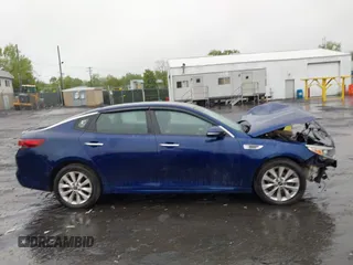 2018 Kia Optima LX z VIN 5XXGT4L30JG202534, wystawiony jako IAAI lot #42222497 z przebiegiem Nie podano mil oraz . Historia ofert i sprzedaży dostępna na DreamBid. Obrazek 13.