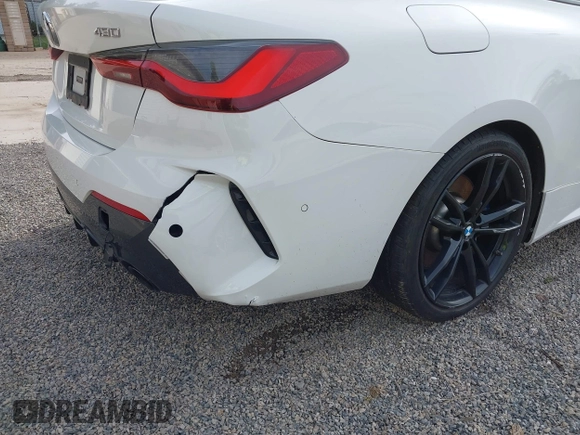 2021 BMW 4 Series 430i xDrive z VIN WBA73AP05MCG14970, wystawiony jako IAAI lot #42335790 z przebiegiem 69 926 mil mil oraz . Historia ofert i sprzedaży dostępna na DreamBid. Obrazek 20.