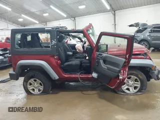 2011 Jeep Wrangler Sport z VIN 1J4AA2D19BL613164, wystawiony jako IAAI lot #42514207 z przebiegiem Nie podano mil oraz . Historia ofert i sprzedaży dostępna na DreamBid. Obrazek 12.