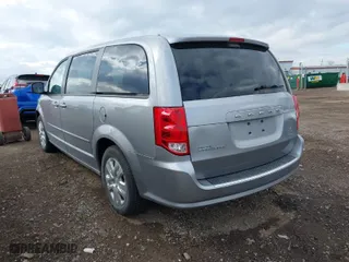 2017 Dodge Grand Caravan SE with VIN 2C4RDGBG9HR549017, listed as a IAAI auction lot 42083557 with 147,065 mi miles. Bid and sale history available at carsss.com. Image 3.