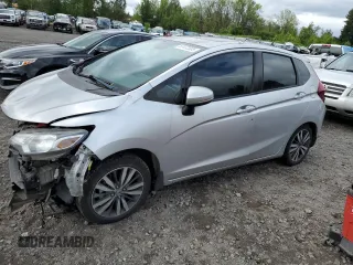 2015 Honda Fit EX-L with VIN 3HGGK5H84FM703169, listed as a Copart auction lot 57472305 with 176,377 mi miles and Salvage title. Bid and sale history available at DreamBid. Image 1.