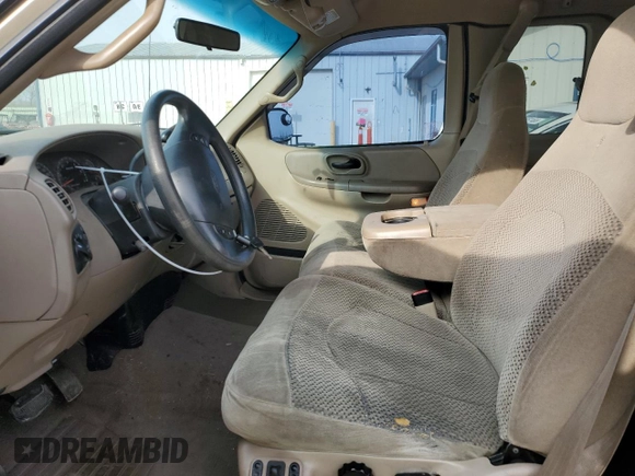 2000 Ford F-150 XL with VIN 2FTRX17W0YCA73568, listed as a Copart auction lot 51128035 with 208,737 mi miles and Salvage Title. Bid and sale history available at carsss.com. Image 7.