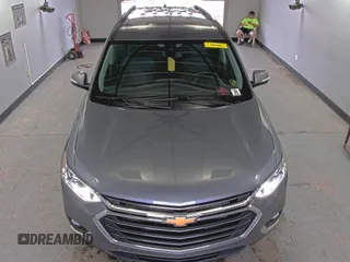 2021 Chevrolet Traverse LT Cloth z VIN 1GNEVGKW8MJ192048, wystawiony jako IAAI lot #42556137 z przebiegiem 106 304 mil mil oraz . Historia ofert i sprzedaży dostępna na DreamBid. Obrazek 23.