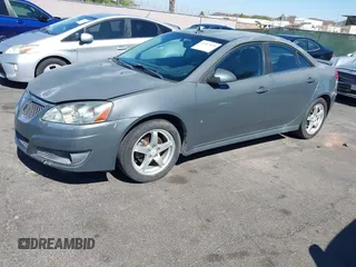 2009 Pontiac G6 GT 1SB z VIN 1G2ZK57K594234408, wystawiony jako IAAI lot #42547870 z przebiegiem 206 547 mil mil oraz . Historia ofert i sprzedaży dostępna na DreamBid. Obrazek 12.