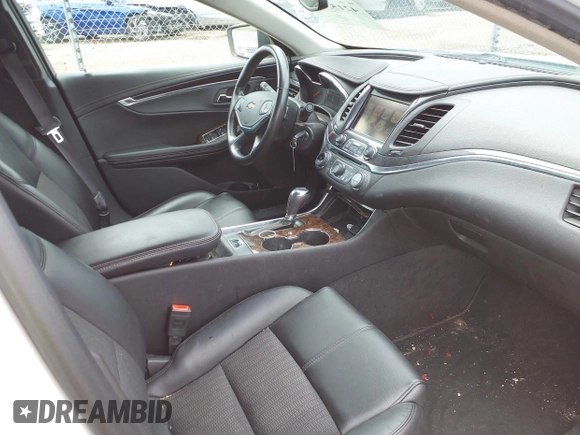 2015 Chevrolet Impala LT with VIN 1G1125S30FU140935, listed as a IAAI auction lot 42153988 with 147,828 mi miles and . Bid and sale history available at DreamBid. Image 5.