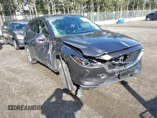 2019 Mazda CX-5 Grand Touring with VIN JM3KFBDM3K1677208, listed as a IAAI auction lot 41929299 with 58,163 mi miles. Bid and sale history available at carsss.com. Image 6.