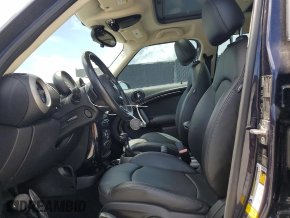 2012 MINI Countryman S with VIN WMWZC5C5XCWL56053, listed as a Copart auction lot 61342905 with 105,922 mi miles and Clean title. Bid and sale history available at DreamBid. Image 7.