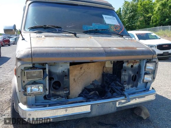 1988 Chevrolet Chevy Van z VIN 1GBEG25K8J7123095, wystawiony jako IAAI lot #42355125 z przebiegiem 92 496 mil mil oraz . Historia ofert i sprzedaży dostępna na DreamBid. Obrazek 12.