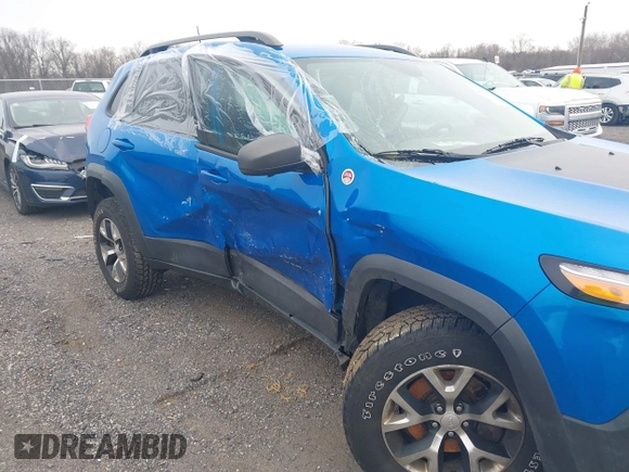 2018 Jeep Cherokee Trailhawk with VIN 1C4PJMBX2JD570976, listed as a IAAI auction lot 41610469 with 151,255 mi miles. Bid and sale history available at carsss.com. Image 6.