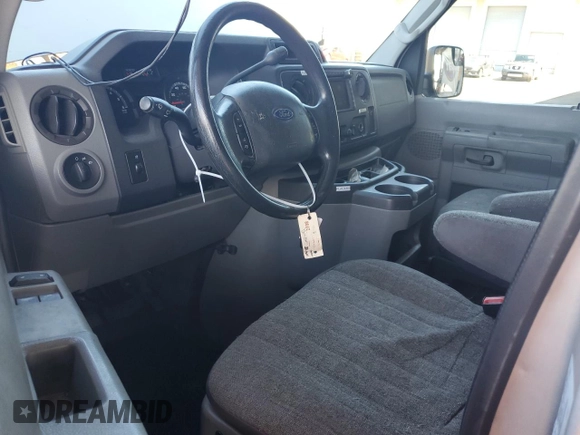 2010 Ford Econoline Passenger XL with VIN 1FMNE1BW3ADA25124, listed as a Copart auction lot 56899235 with 244,010 mi miles and Salvage title. Bid and sale history available at DreamBid. Image 8.
