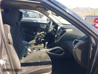 2015 Hyundai Veloster with VIN KMHTC6AD1FU233648, listed as a IAAI auction lot 41822881 with 162,368 mi miles. Bid and sale history available at carsss.com. Image 5.