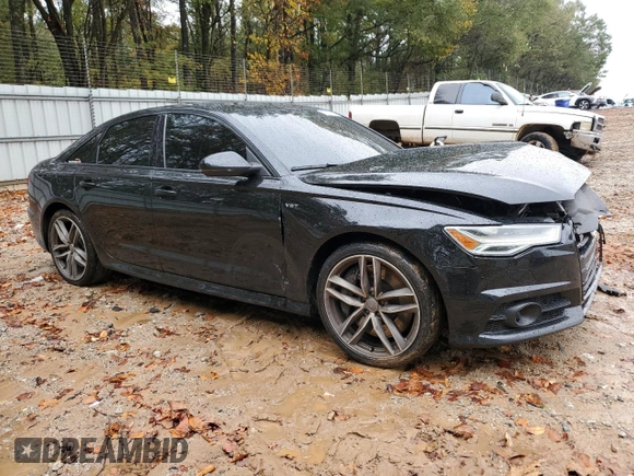 2016 Audi S6 Prestige z VIN WAUH2AFC8GN131045, wystawiony jako Copart lot #80532794 z przebiegiem 98 827 mil mil oraz Szkoda całkowita • Salvage title. Historia ofert i sprzedaży dostępna na DreamBid. Obrazek 4.