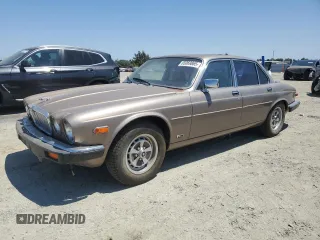 1986 Jaguar XJ with VIN SAJAY1346GC439179, listed as a Copart auction lot 65069865 with 76,018 mi miles and Clean title. Bid and sale history available at DreamBid. Image 1.