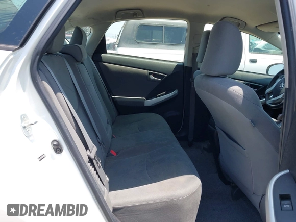 2012 Toyota Prius One z VIN JTDKN3DU3C5386610, wystawiony jako IAAI lot #42386857 z przebiegiem 171 968 mil mil oraz . Historia ofert i sprzedaży dostępna na DreamBid. Obrazek 8.