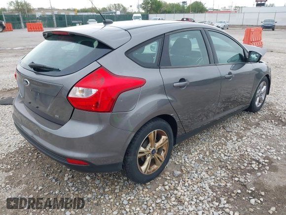 2014 Ford Focus SE with VIN 1FADP3K22EL363702, listed as a IAAI auction lot 42010258 with 96,392 mi miles. Bid and sale history available at carsss.com. Image 4.