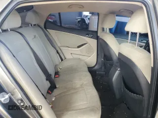 2011 Kia Optima LX z VIN KNAGM4A74B5131876, wystawiony jako Copart lot #69256644 z przebiegiem 117 718 mil mil oraz Szkoda całkowita • Salvage title. Historia ofert i sprzedaży dostępna na DreamBid. Obrazek 10.