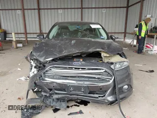2015 Ford Fusion Titanium with VIN 3FA6P0K97FR244227, listed as a IAAI auction lot 41625135 with 119,313 mi miles. Bid and sale history available at carsss.com. Image 12.