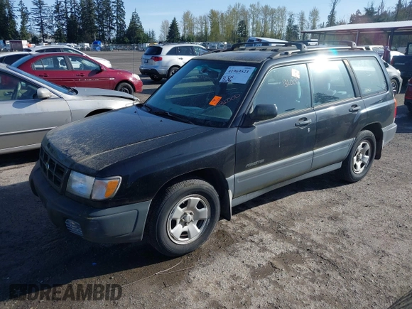 1999 Subaru Forester L with VIN JF1SF6351XH716957, listed as a IAAI auction lot 41969521 with 253,696 mi miles. Bid and sale history available at carsss.com. Image 2.