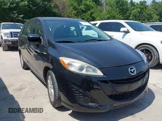 2012 Mazda 5 Sport z VIN JM1CW2BL0C0142657, wystawiony jako IAAI lot #42389495 z przebiegiem 107 790 mil mil oraz . Historia ofert i sprzedaży dostępna na DreamBid. Obrazek 1.
