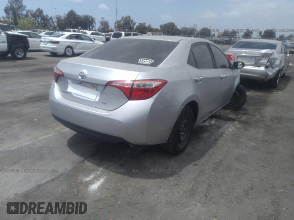 2015 Toyota Corolla L with VIN 5YFBURHE0FP281457, listed as a IAAI auction lot 39664934 with Not Provided miles and . Bid and sale history available at DreamBid. Image 4.