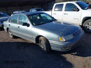 1998 Toyota Avalon XL with VIN 4T1BF18BXWU250149, listed as a IAAI auction lot 41568370 with 299,990 mi miles and . Bid and sale history available at DreamBid. Image 1.
