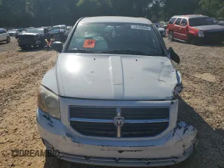 2011 Dodge Caliber Mainstreet z VIN 1B3CB3HA7BD116153, wystawiony jako Copart lot #53153945 z przebiegiem Nie podano mil oraz Szkody całkowita. Historia ofert i sprzedaży dostępna na DreamBid. Obrazek 5.
