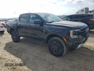 2024 Ford Ranger XLT with VIN 1FTER4GHXRLE33755, listed as a Copart auction lot 42812135 with 1,012 mi miles and Salvage Title. Bid and sale history available at carsss.com. Image 4.