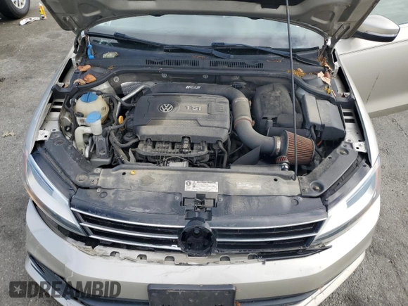 2015 Volkswagen Jetta SE z VIN 3VWD17AJ3FM232299, wystawiony jako Copart lot #57252465 z przebiegiem 128 882 mil mil oraz Szkoda całkowita • Salvage title. Historia ofert i sprzedaży dostępna na DreamBid. Obrazek 11.