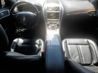 2017 Lincoln MKZ Select z VIN 3LN6L5C96HR660124, wystawiony jako Copart lot #57961315 z przebiegiem 90 770 mil mil oraz Szkoda całkowita • Salvage title. Historia ofert i sprzedaży dostępna na DreamBid. Obrazek 8.