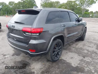 2018 Jeep Grand Cherokee Altitude z VIN 1C4RJEAG2JC428214, wystawiony jako IAAI lot #42661661 z przebiegiem 81 859 mil mil oraz . Historia ofert i sprzedaży dostępna na DreamBid. Obrazek 4.