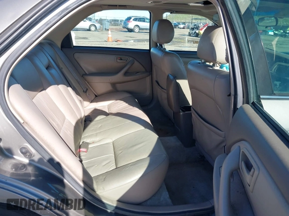 1998 Toyota Camry LE z VIN 4T1BG28KXWU248887, wystawiony jako IAAI lot #41507392 z przebiegiem Nie podano mil oraz . Historia ofert i sprzedaży dostępna na DreamBid. Obrazek 8.