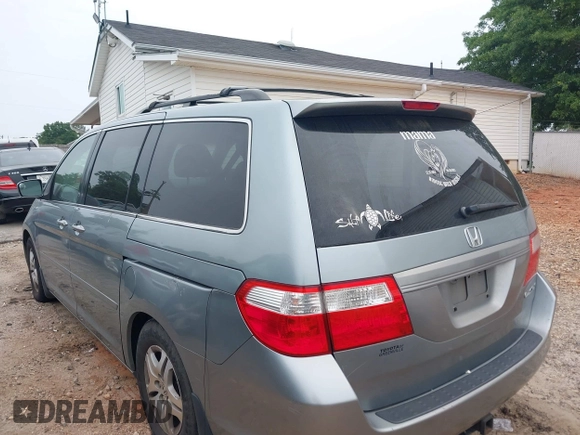 2005 Honda Odyssey EX-L with VIN 5FNRL38735B031513, listed as a IAAI auction lot 42197247 with 276,584 mi miles and . Bid and sale history available at DreamBid. Image 3.