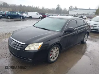 2006 Toyota Avalon XL with VIN 4T1BK36B86U073711, listed as a IAAI auction lot 41805086 with 158,044 mi miles and . Bid and sale history available at carsss.com. Image 2.