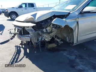 2014 Chevrolet Impala LT with VIN 2G1125S33E9256206, listed as a IAAI auction lot 41829287 with 198,661 mi miles and . Bid and sale history available at DreamBid. Image 6.
