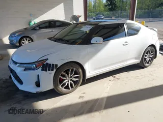 2014 Scion tC with VIN JTKJF5C7XE3073478, listed as a IAAI auction lot 42058385 with 151,491 mi miles. Bid and sale history available at carsss.com. Image 18.