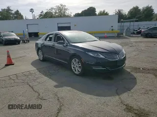 2014 Lincoln MKZ z VIN 3LN6L2GK6ER806741, wystawiony jako Copart lot #57455755 z przebiegiem 96 849 mil mil oraz Szkoda całkowita • Salvage title. Historia ofert i sprzedaży dostępna na DreamBid. Obrazek 13.