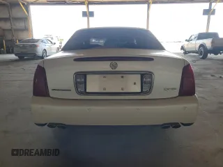 2001 Cadillac DeVille DHS z VIN 1G6KE57Y41U150631, wystawiony jako Copart lot #61805295 z przebiegiem 96 158 mil mil oraz Czysty tytuł • Clean title. Historia ofert i sprzedaży dostępna na DreamBid. Obrazek 6.