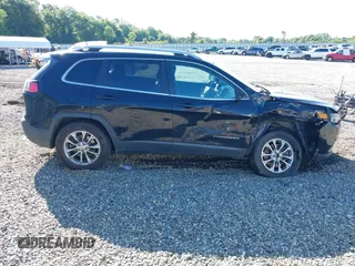 2019 Jeep Cherokee Latitude Plus with VIN 1C4PJMLBXKD229927, listed as a IAAI auction lot 42238552 with 90,984 mi miles and . Bid and sale history available at DreamBid. Image 13.