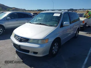 2002 Honda Odyssey EX-L z VIN 2HKRL18922H582244, wystawiony jako IAAI lot #42385121 z przebiegiem 253 186 mil mil oraz . Historia ofert i sprzedaży dostępna na DreamBid. Obrazek 2.