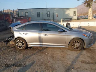 2015 Hyundai Sonata 2.4L Sport with VIN 5NPE34AF4FH019959, listed as a IAAI auction lot 41020000 with 129,535 mi miles. Bid and sale history available at carsss.com. Image 13.