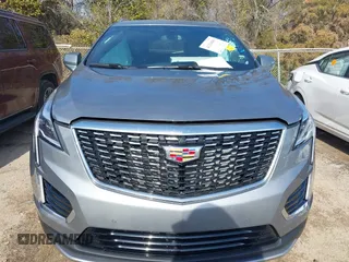 2025 Cadillac XT5 FWD Premium Luxury with VIN 1GYKNCRS1SZ120351, listed as a IAAI auction lot 41334881 with 4,915 mi miles. Bid and sale history available at carsss.com. Image 12.