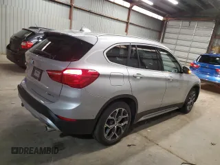 2021 BMW X1 xDrive28i with VIN WBXJG9C01M5T49891, listed as a Copart auction lot 51126685 with 93,696 mi miles and Clean Title. Bid and sale history available at carsss.com. Image 3.